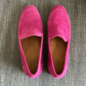 These are a beautiful pair of suede, “eyelet” loafers. They are unworn.